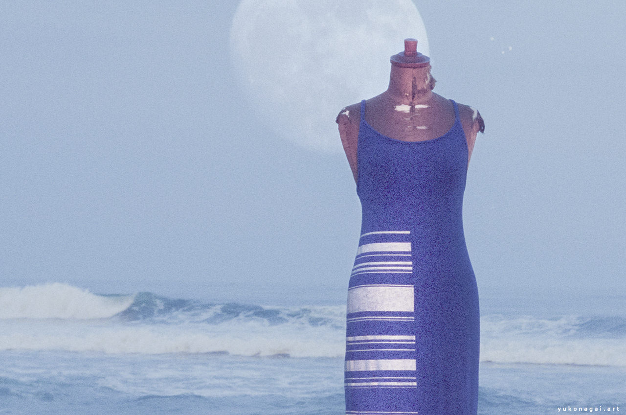 A dress with painted barcode by sea shore with moon overlay.
