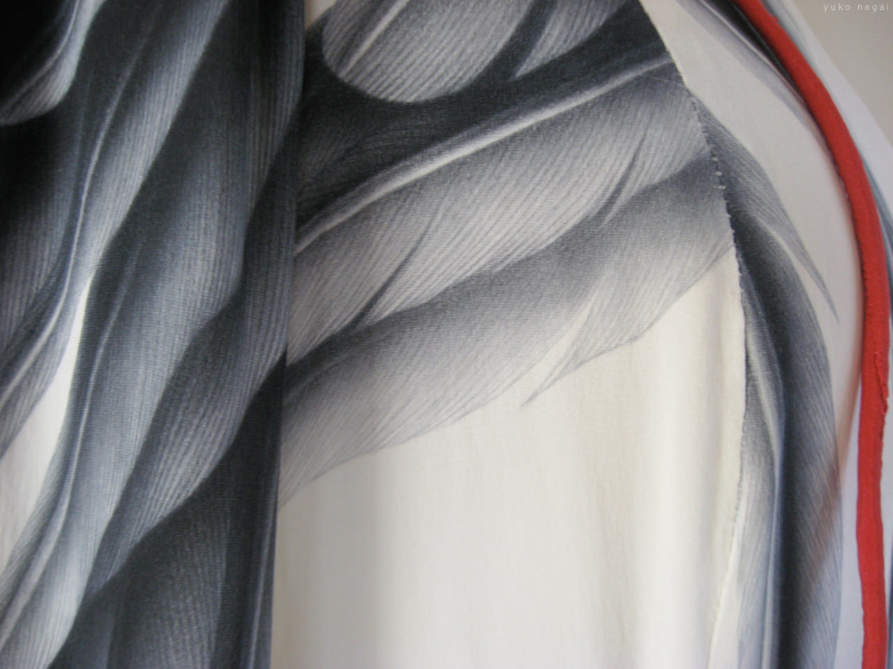 A wing painting on a dress.